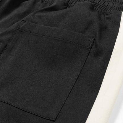 Pantalones de jogging de movimiento paralelo